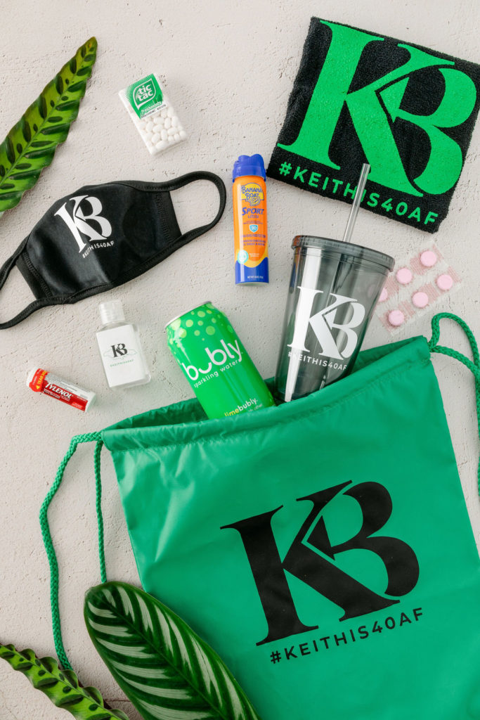 Black, Green, and White Birthday Party Welcome bag with custom monogram and branded tumbler, hand sanitizer, and face mask